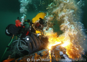 Commercial Diver burning by Ryan Miller 